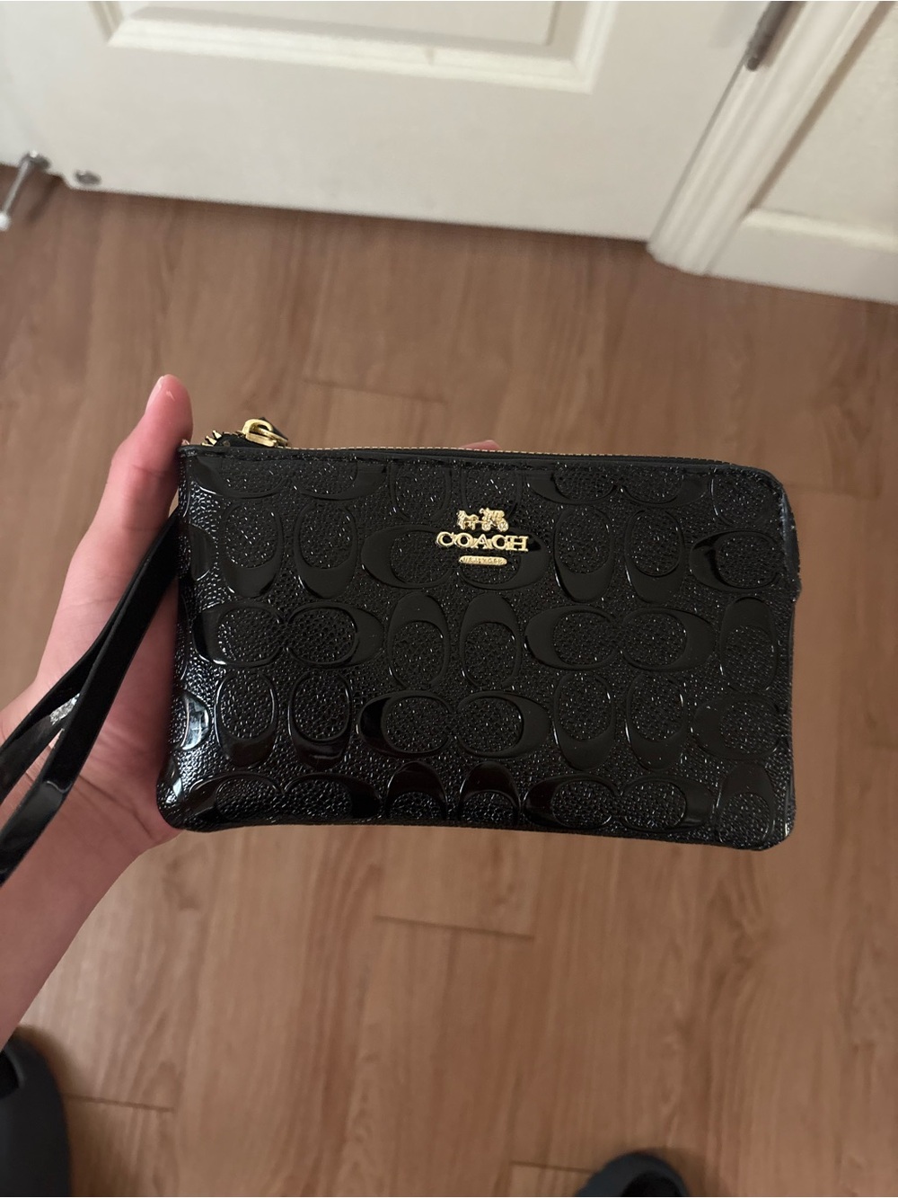 Coach Black Patent Signature Wristlet with Gold Logo